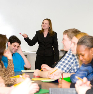 Teacher with Students in Discussion